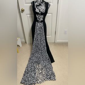 Zilka, 10, NWOT, full length black dress with black and white train.